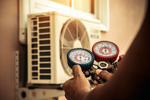 Professional Air Conditioning Service technician working in Lansdowne, MD
